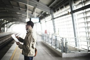 African Man Waiting Train Public Transportation Concept